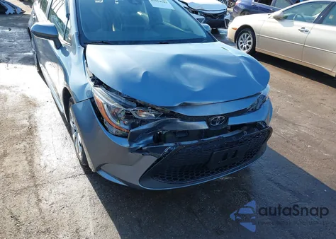 2021 Toyota Corolla Le z USA, uszkodzony, nr VIN JTDEPMAE5MJ157493